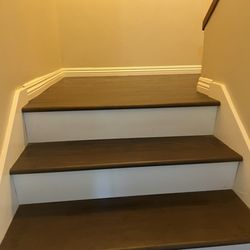 Craft & Bulk Flooring - After laminate stairing with white risers