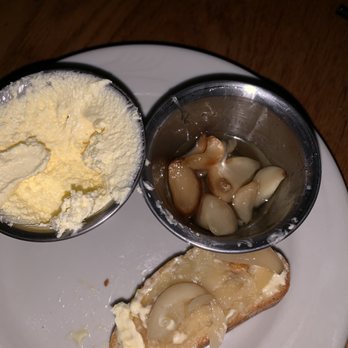 Pelican's Restaurant - Bread with butter and whole soft garlic cloves cooked soft in oil. . - Seafood Near Me - Albuquerque, New Mexico Pelican's Restaurant - Bread with butter and whole soft garlic cloves cooked soft in oil. . - Seafood Near Me - Albuquerque, New Mexico