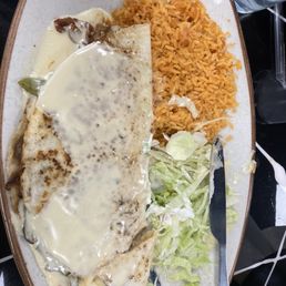 Large Grilled Steak Quesadilla sour cream salad, rice over $20.00 Large Grilled Steak Quesadilla sour cream salad, rice over $20.00
