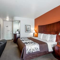 Sleep Inn & Suites Lawton Near Fort Sill - Our large King room. All room and suites come with a microwave oven and refrigerator.