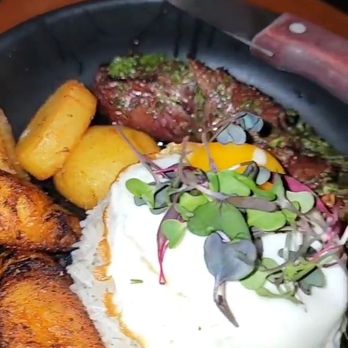 Aji Peruvian Cuisine - STEAK A LO POBRE Grilled hangar steak, chimichurri, roasted potatoes, fried bananas, fried egg and steamed rice $29 - Peruvian Near Me - Long Beach, California Aji Peruvian Cuisine - STEAK A LO POBRE Grilled hangar steak, chimichurri, roasted potatoes, fried bananas, fried egg and steamed rice $29 - Peruvian Near Me - Long Beach, California
