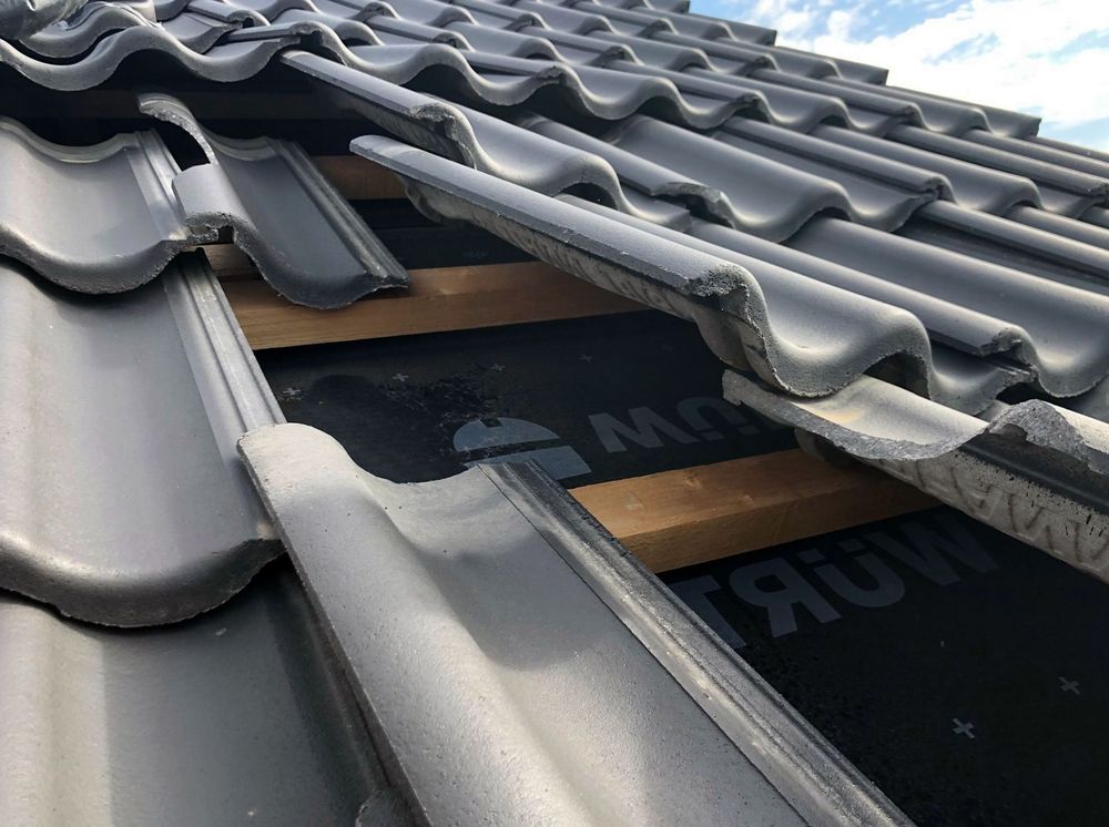 Slide of Arlanza Roofing