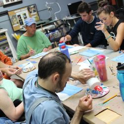 Arts Of Life - Artists working with volunteer Cindy
