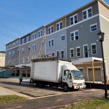 AJ Gutters Services - New gutters on road of town house. - Gutter Services Near Me AJ Gutters Services - New gutters on road of town house. - Gutter Services Near Me