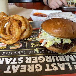 a burger and onion rings a burger and onion rings