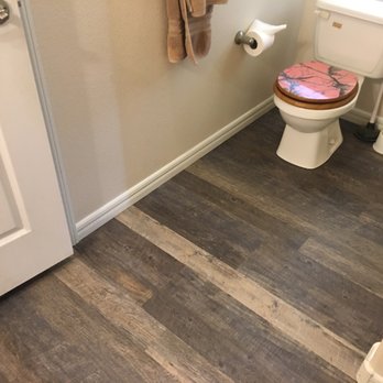 Ascent builders - a bathroom with a toilet and a towel rack - General Contractors Near Me - Ruidoso, New Mexico