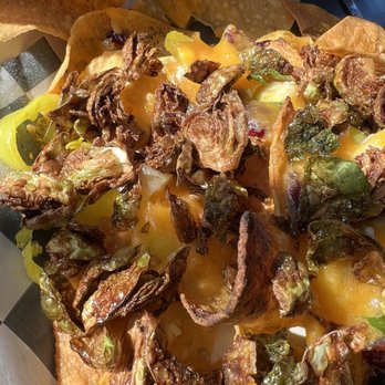 Strange Design Public House - Brussel sprouts nachos with banana peppers are delicious - Chicken Wings Near Me - Geneseo, New York Strange Design Public House - Brussel sprouts nachos with banana peppers are delicious - Chicken Wings Near Me - Geneseo, New York