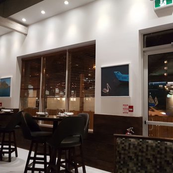 Floga Estiatorio and Event Space - Well decorated walls play nice with the music for an authentic Greek feel. - Greek Near Me - Toronto, Ontario