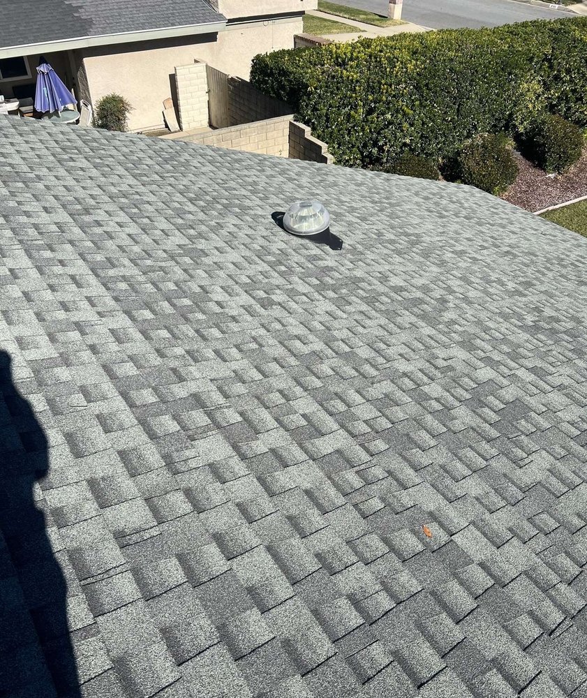 Slide of Alpha Roofing Group