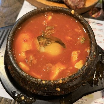 BCD Tofu House - Oyster soon tofu soup with raw egg cracked in - danger spicy! - Korean Near Me - New York, New York BCD Tofu House - Oyster soon tofu soup with raw egg cracked in - danger spicy! - Korean Near Me - New York, New York
