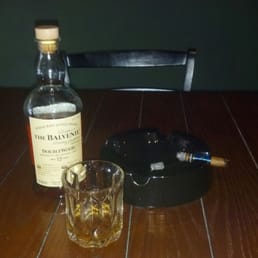 Scotch and a cigar. Perfection. Scotch and a cigar. Perfection.