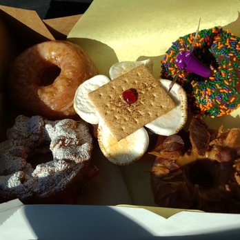 Jarams Donuts - Top L to R: original Cronut, reg chocolate sprinkle, smore, strawberry nutella funnel cake, reg maple bacon, jumbo cheese kolache - Donuts Near Me - Dallas, Texas Jarams Donuts - Top L to R: original Cronut, reg chocolate sprinkle, smore, strawberry nutella funnel cake, reg maple bacon, jumbo cheese kolache - Donuts Near Me - Dallas, Texas
