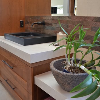 The Renovation Studio - a bathroom with a sink and a potted plant - General Contractors Near Me The Renovation Studio - a bathroom with a sink and a potted plant - General Contractors Near Me