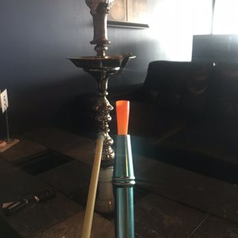 Layla's Hookah Lounge - a hookah on a table - Hookah Bars Near Me - Golden, Colorado