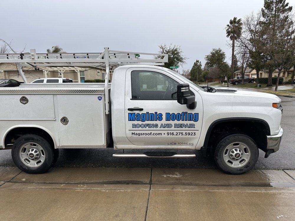 Slide of Maginis Roofing