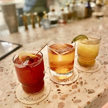 Atrium - Polibean punch, Loma, and original punch - New American Near Me - Atlanta, Georgia Atrium - Polibean punch, Loma, and original punch - New American Near Me - Atlanta, Georgia