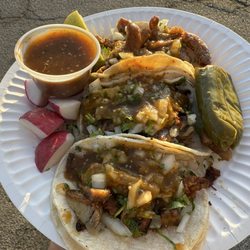 Karina's Tacos - A few tacos from their taco truck paired with their delicious red salsa and a juicy jalapeño!