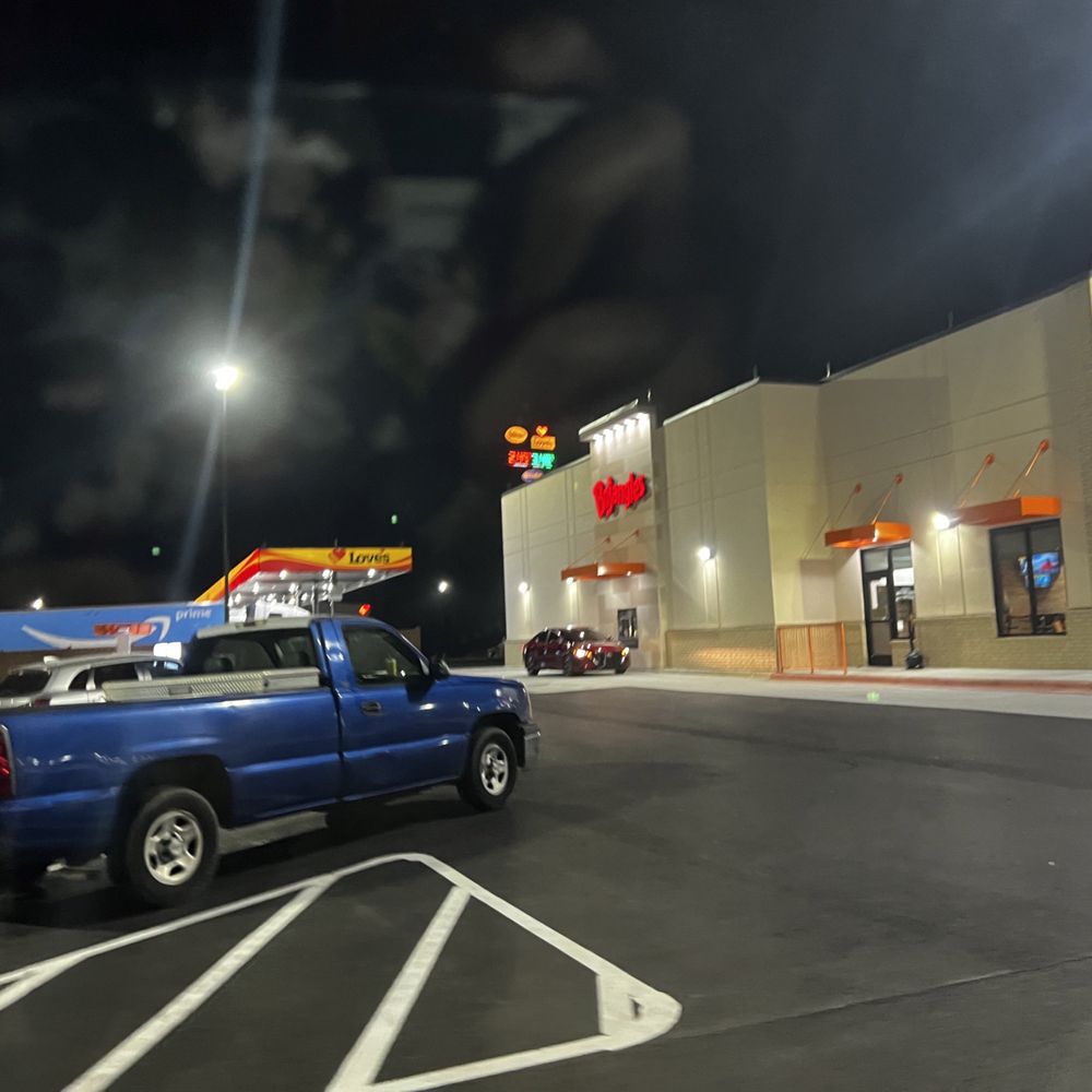 Love's Travel Stop - a blue pickup truck parked in front of a store - Gas Stations Near Me - Picayune, Mississippi