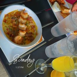 Shrimp and grits Bottomless mimosas Shrimp and grits Bottomless mimosas