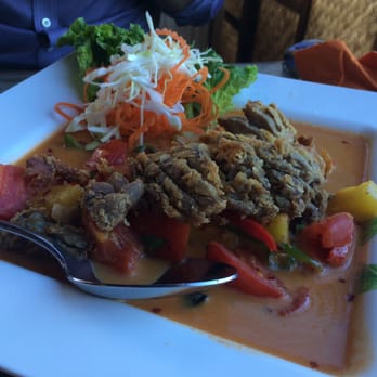 NaraDeva Thai Restaurant - Red curry duck! Crispy and tender duck with a medium spicy curry. - Thai Near Me - Orlando, Florida