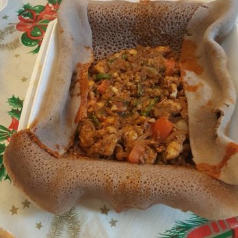 Arif Cafe - Special Ethiopian "fish gulash" with enjera bread - Ethiopian Near Me - Dallas, Texas