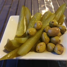 Complimentary olives and pickles, very tasty. Complimentary olives and pickles, very tasty.