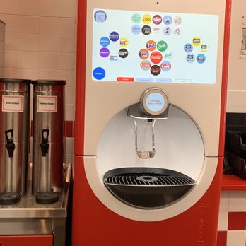 Five Guys - a soda dispenser in a kitchen - Burgers Near Me - Boynton Beach, Florida