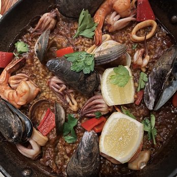 Barcelona Wine Bar - Paella Mariscos: shrimp, mussels, clams, calamari - Wine Bars Near Me - Houston, Texas Barcelona Wine Bar - Paella Mariscos: shrimp, mussels, clams, calamari - Wine Bars Near Me - Houston, Texas