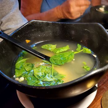 Rustic Spoon - Valley Village - The serving bowl of tofu soup with spinach. The broth and the soup is amazing. So simple yet delicious. - Thai Near Me - Valley Village, California