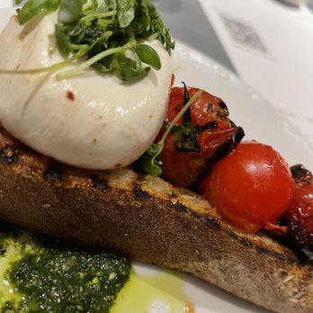 Sixty Vines - Burrata on grilled toast with charred tomatoes - Wine Bars Near Me - Winter Park, Florida Sixty Vines - Burrata on grilled toast with charred tomatoes - Wine Bars Near Me - Winter Park, Florida