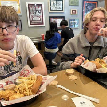 Raising Cane's Chicken Fingers - Annoyed kids eating fried chicken lol - Chicken Shop Near Me - Davis, California Raising Cane's Chicken Fingers - Annoyed kids eating fried chicken lol - Chicken Shop Near Me - Davis, California