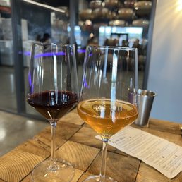 two glasses of wine on a table