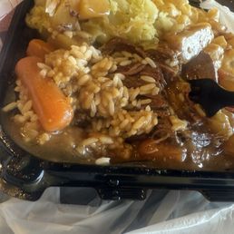 Pot roast over rice, with veggies, cabbage and Mac n cheese