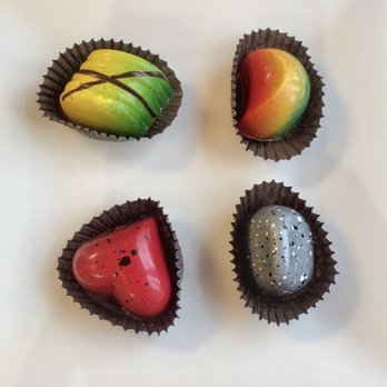 William Dean Chocolates - Starting top left, counterclockwise. Lemongrass, tropical, coconut, and strawberry caramel. - Chocolatiers & Shops Near Me - Belleair Bluffs, Florida William Dean Chocolates - Starting top left, counterclockwise. Lemongrass, tropical, coconut, and strawberry caramel. - Chocolatiers & Shops Near Me - Belleair Bluffs, Florida