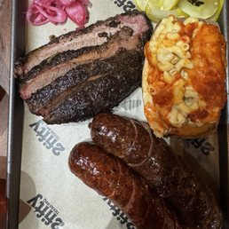 (Hot and mild) Sausage, wagyu brisket, Mac and cheese, picked cukes and red onion.