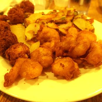Tim's Tavern - Fried shrimp with tavern fries. A few added hush puppies - Seafood Near Me - Canton, Ohio