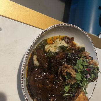7th + Grove - Braised Oxtails with greens and mashed potatoes. - Southern Near Me - Tampa, Florida