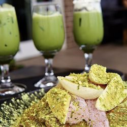 The Ravens Nest - Matcha Tea flight with banana pancakes