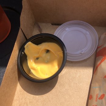 Taco Bell - Side of cheese- mot much - Fast Food Near Me - Saint Pauls, North Carolina
