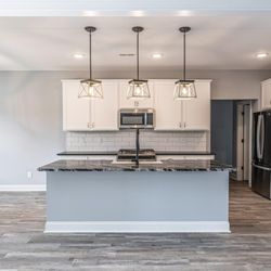 World Stone - Kitchen island (polished granite) and 2 countertops (black leathered