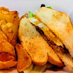 Wrap City - The Martha's Fav sandwich is delicious! Traditional BLT, avocado, chipotle aioli, topped with a fried egg, on grilled sourdough.