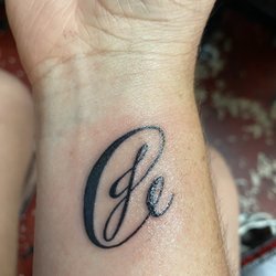 Sailor Cher's Tattoo & Body Piercing - My husband's, mine, and my daughters initials