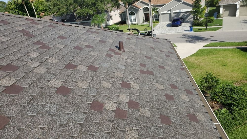 Slide of Honest Abe Roofing Tampa