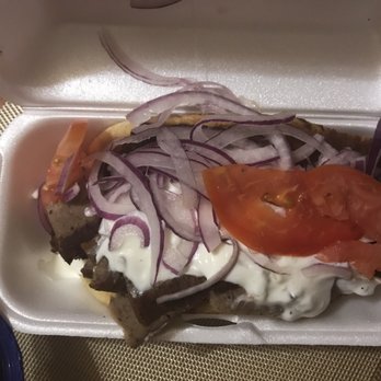 Nicky's The Real McCoy - Top view of a gyro - Greek Near Me - Chicago, Illinois Nicky's The Real McCoy - Top view of a gyro - Greek Near Me - Chicago, Illinois