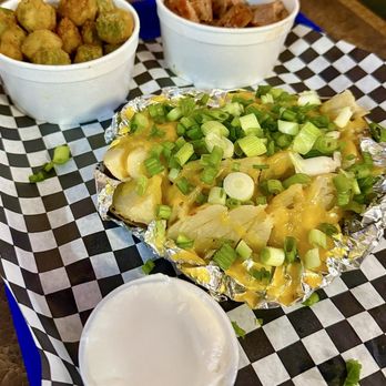 Uncle's BBQ  - Half Baked Potato with Jalapeño Sausage and Elote - Barbeque Near Me - Tomball, Texas