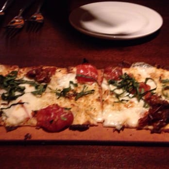 Seasons 52 - Roma tomato flatbread. Tasty appetizer! - New American Near Me - Princeton, New Jersey Seasons 52 - Roma tomato flatbread. Tasty appetizer! - New American Near Me - Princeton, New Jersey