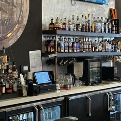 The Barrel Room - Well stocked bar with top shelf hooch