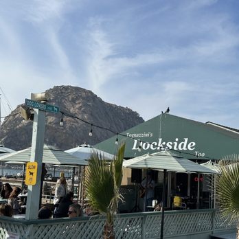 Tognazzini's Dockside - View of the Morro bay rock along with the restaurant - Seafood Near Me - Morro Bay, California Tognazzini's Dockside - View of the Morro bay rock along with the restaurant - Seafood Near Me - Morro Bay, California