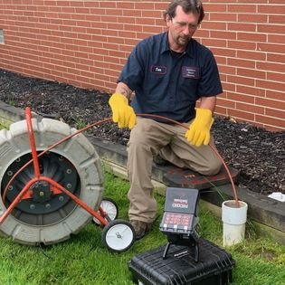 Slide of American Sewer Cleaners
