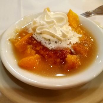 Dooky Chase's Restaurant - Peach Cobbler (served hot & fresh) - Cajun/Creole Near Me - New Orleans, Louisiana Dooky Chase's Restaurant - Peach Cobbler (served hot & fresh) - Cajun/Creole Near Me - New Orleans, Louisiana